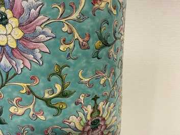 A large Chinese famille rose cylindrical vase with applied lotus scrolls, Jiaqing/Daoguang
